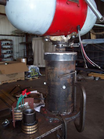 Close up of generator and bearing assy. Note the channel provided for the generator wiring to run down through the mount, and through the center of the bearing assy. The bottom flange on the bearing assy was made to fit the current top flange on my existing tower.